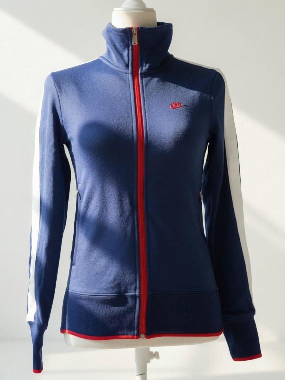 Nike sportwear royal blue zip up jacket with white stripes on sleeves